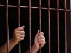 depositphotos_123107748-stock-photo-handle-steel-cage-confined