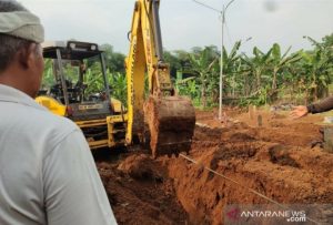 pemkot-bogor-gali-lubang-makam-untuk-jenazah-covid-19-220802b-rev1.jpg