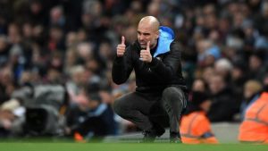 resmi-pep-guardiola-perpanjang-kontrak-di-man-city-2208060-rev2.jpg