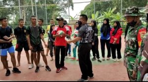 dansatgas-tmmd-ke-108-kodim-0402-oki-main-bola-volly-bersama-warga-2208060-rev2.jpg