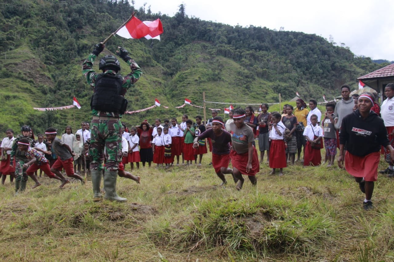 rasa-bangga-tergambar-dikemeriahan-hut-kemerdekaan-indonesia-ke-77-di-pegunungan-tengah-220824s.jpg