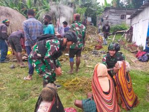 satgas-pamtas-ri-png-yonif-raider-142kj-bantu-proses-perdamaian-perang-suku-2209055.jpg